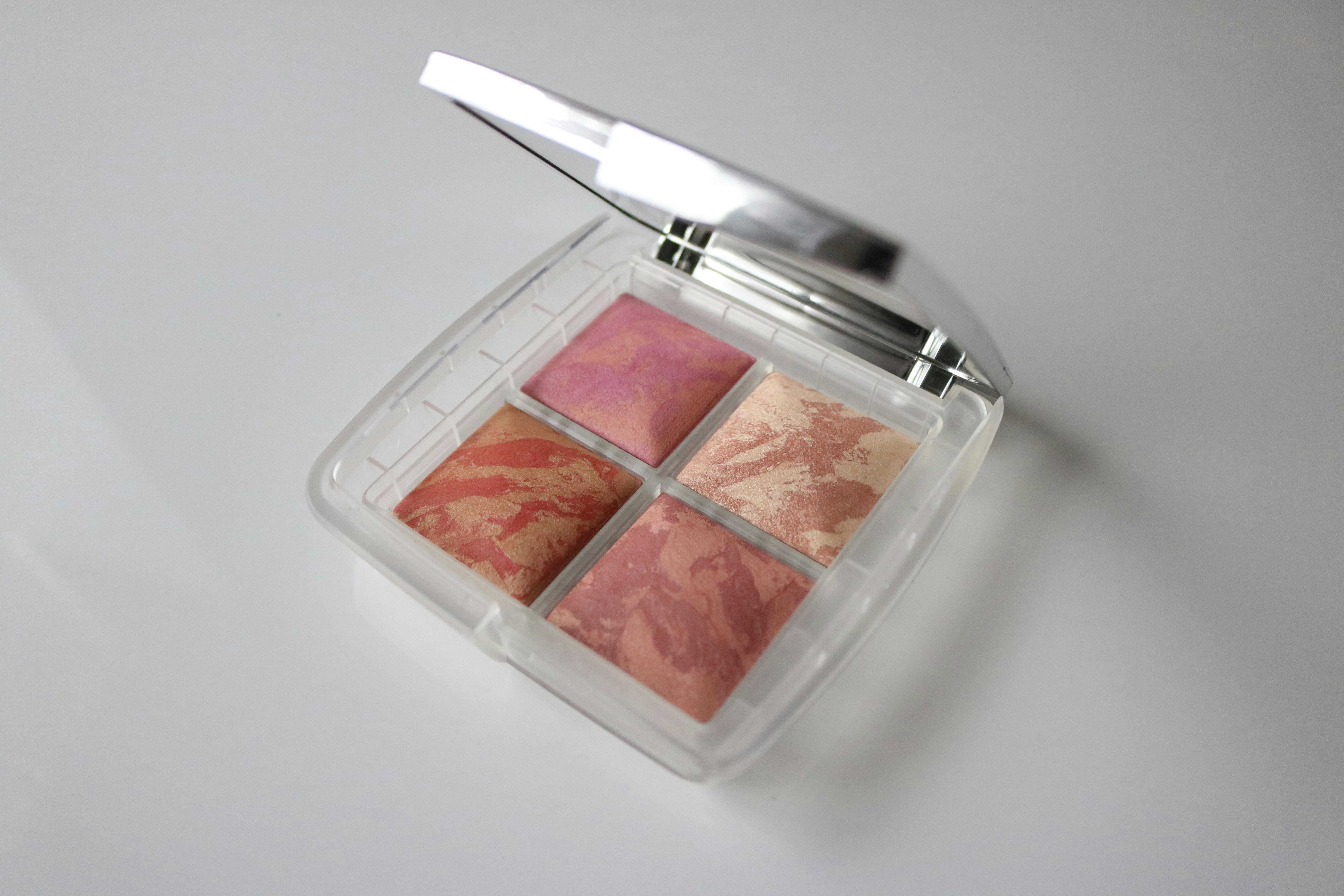 Clear compact case with four square blush pans